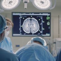 Hospital rush with doctors treating a patient with a traumatic brain injury in the ER. Featuring urgent care and rapid assessment
